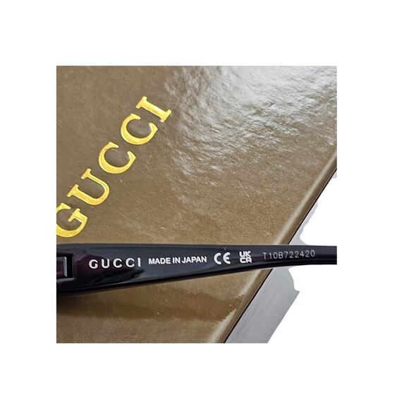 Gucci GG1650S 002 shield mask sunglass with a shiny black frame main image 4